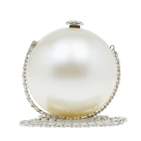 chanel round bag with pearls|chanel bag with charms.